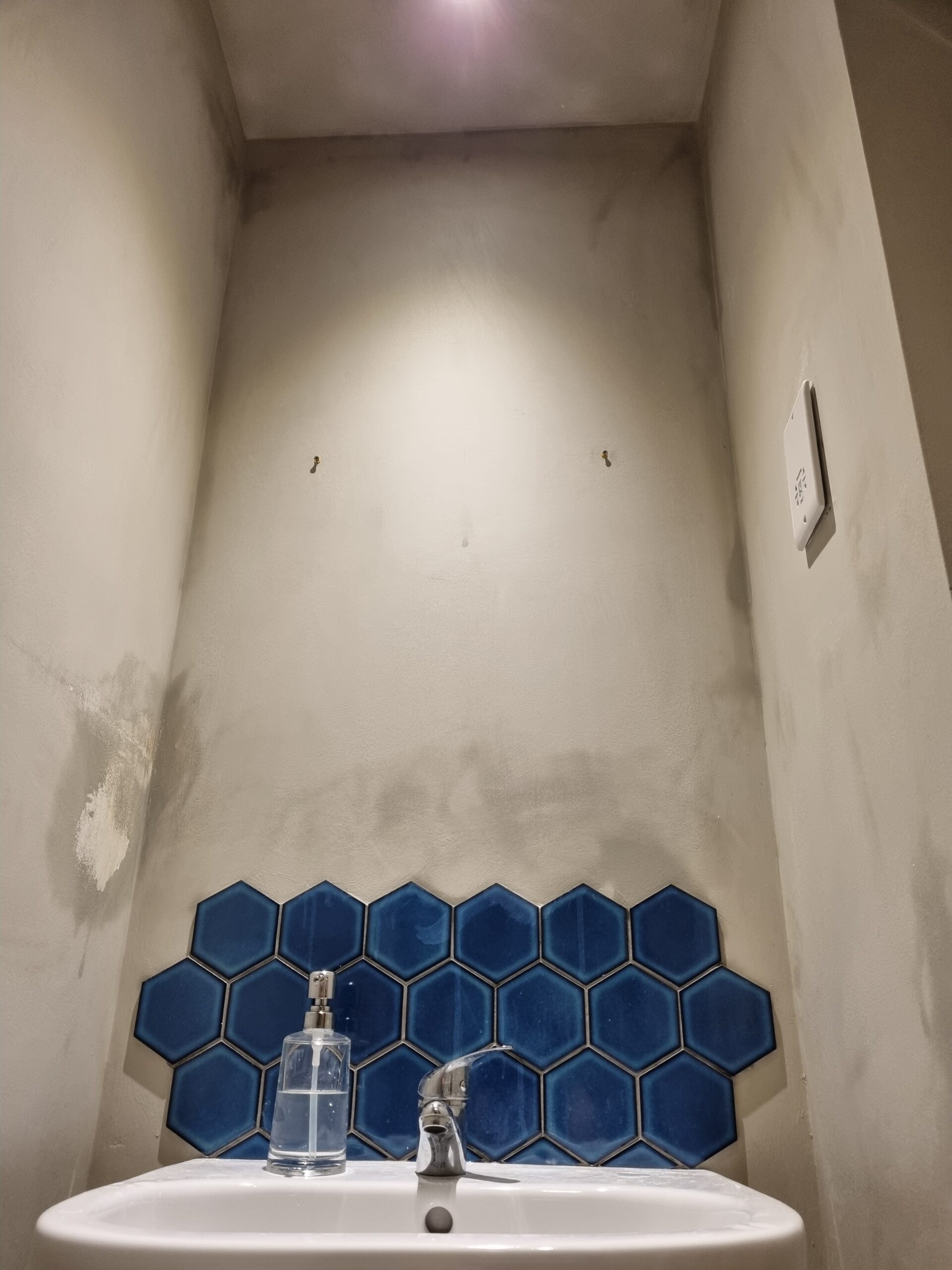 toilet room before poka dot papering